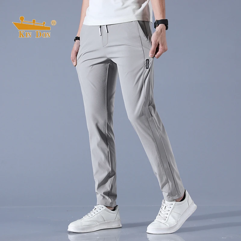 金盾春夏薄款2025新款透气爆款百搭舒适弹力男士直筒冰丝裤休闲裤