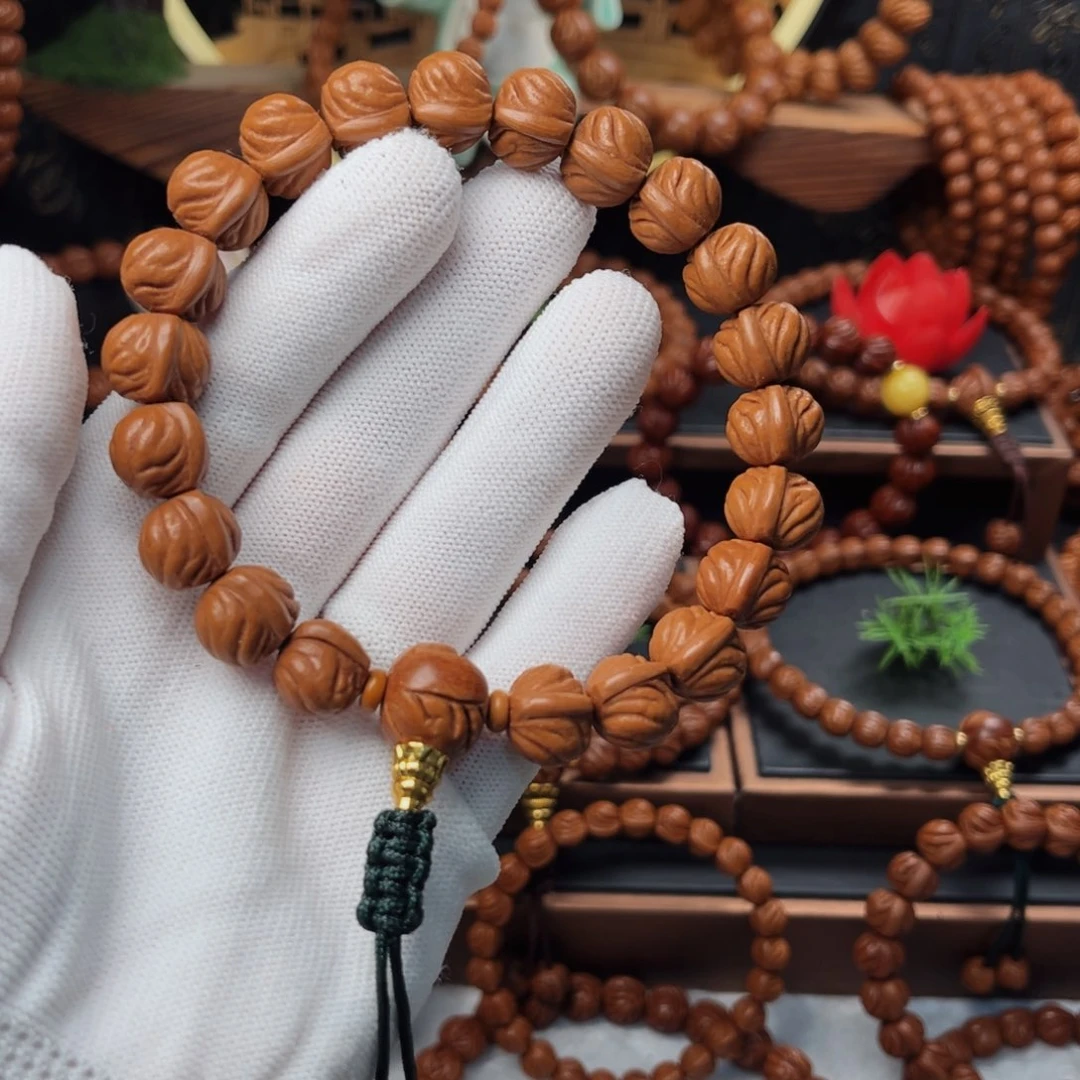 吊坠桃核13新款双脊龙手持