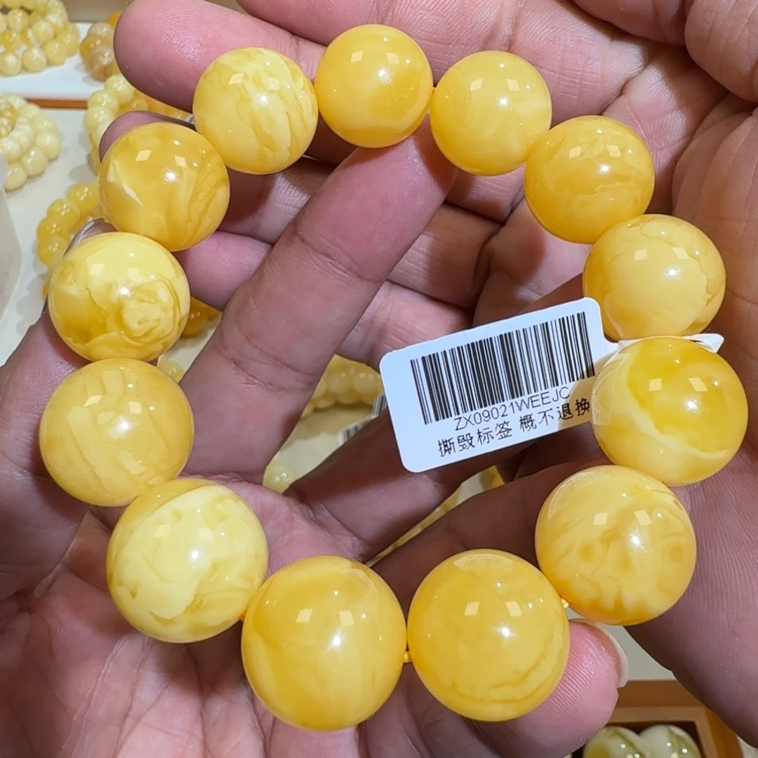 琥珀未镶嵌珠宝奇石17m+焦皮浓花蜡圆珠串37.1