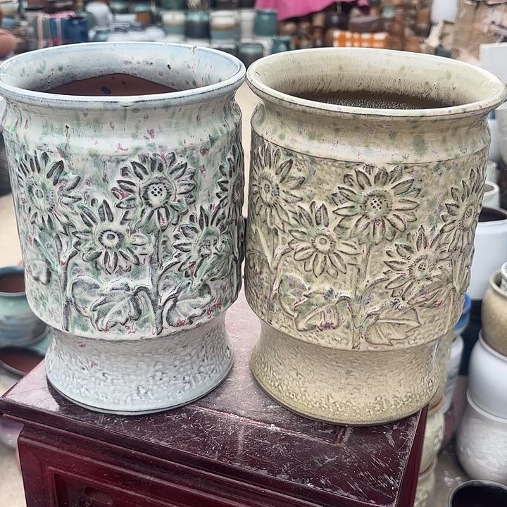 红陶太阳花两个色口径17高度24