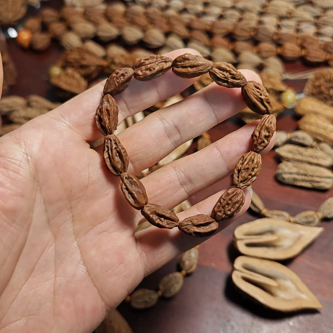 文玩核桃把件水*桃沉水老花瓣秋子