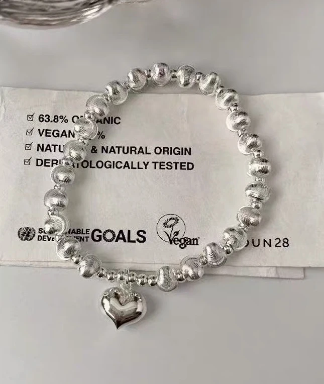 YZ036 爱心猫眼 银色精品手链 无礼盒