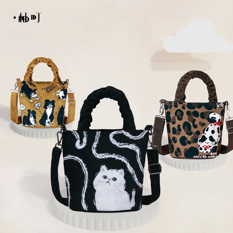 柚町X可斜跨可单肩线条猫小众百搭学生妈咪包时尚布面手拎褶皱包