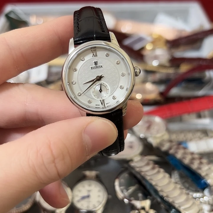 伤***起钢牛皮（革）钢石英机芯