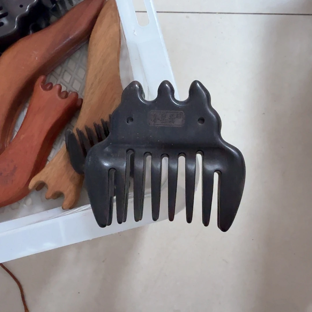 紫光檀三潭印月梳子瑕疵