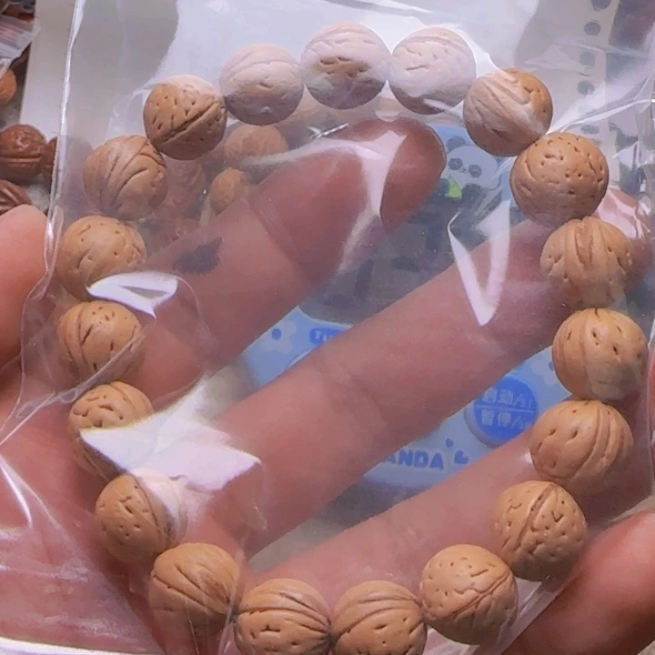 、**夜拍25野生桃核黄桃手串一条