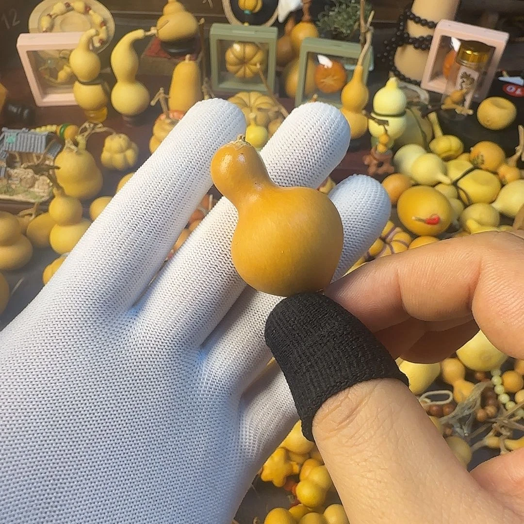 菡***潞木葫芦一枚小葫芦鸟