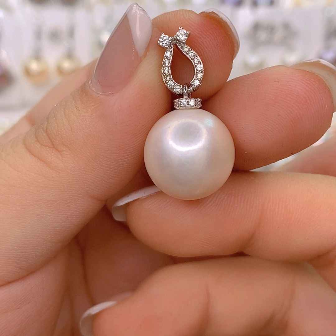 艾****淡水珍珠银S925镶嵌颈饰