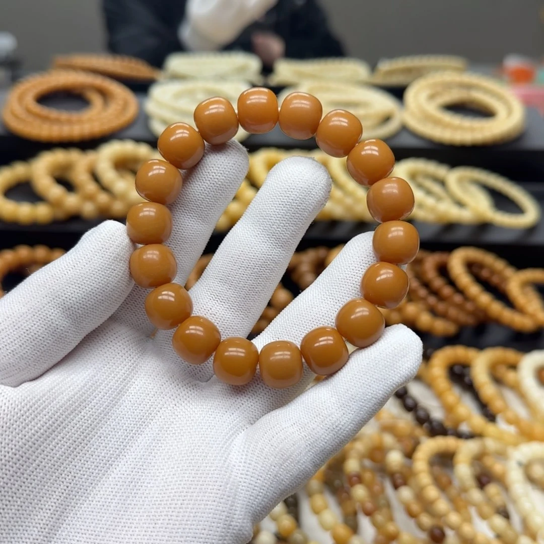 萧***萧菩提根/象牙果手串12×13 11年 鬼工