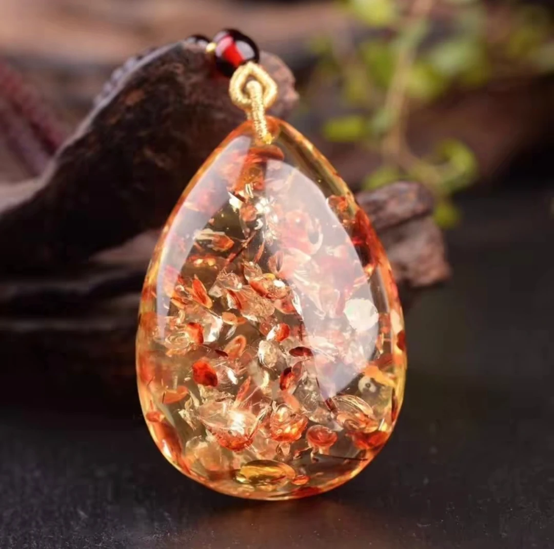 G555时尚潮流花珀水滴吊坠