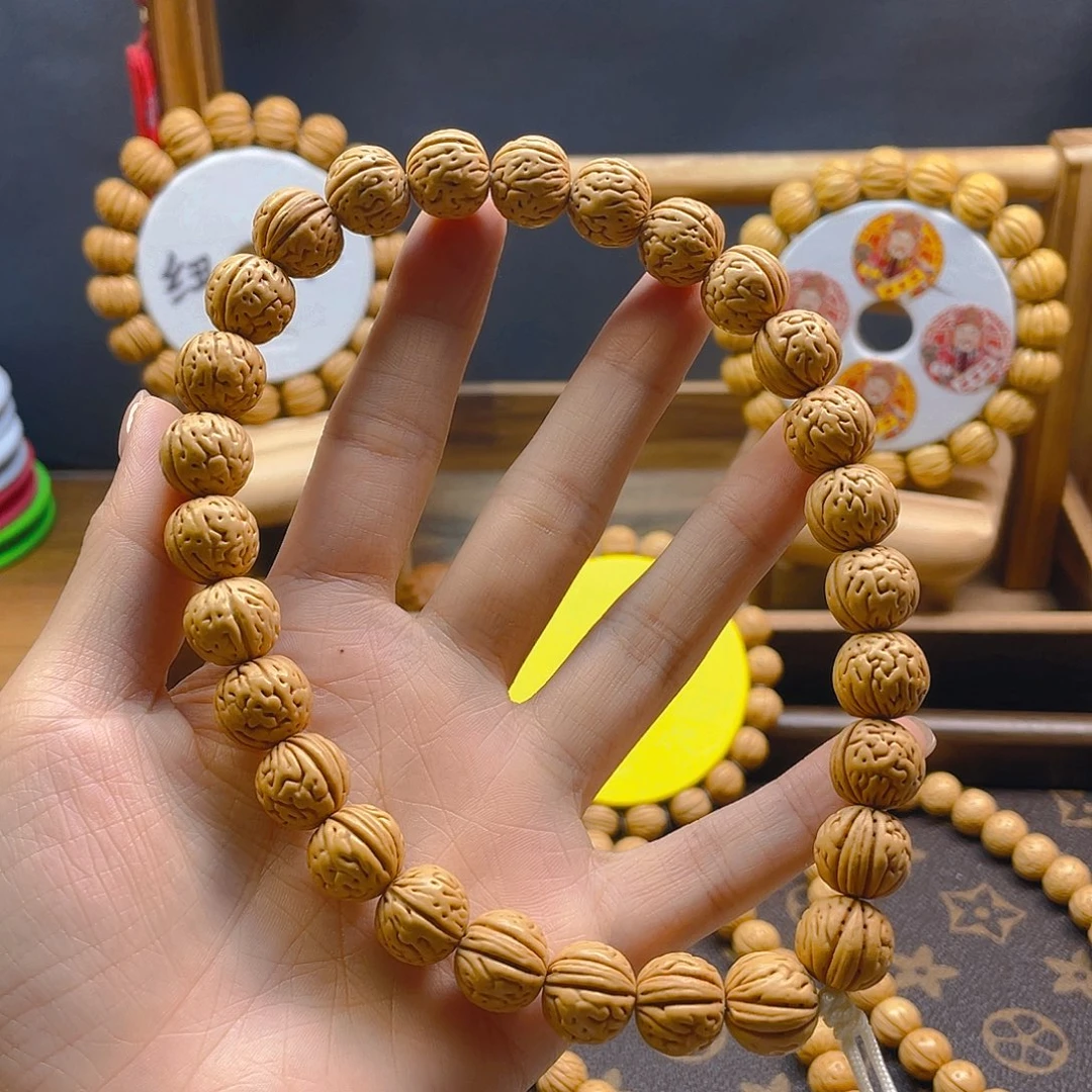 灿***光桃核手串，桃核手串
