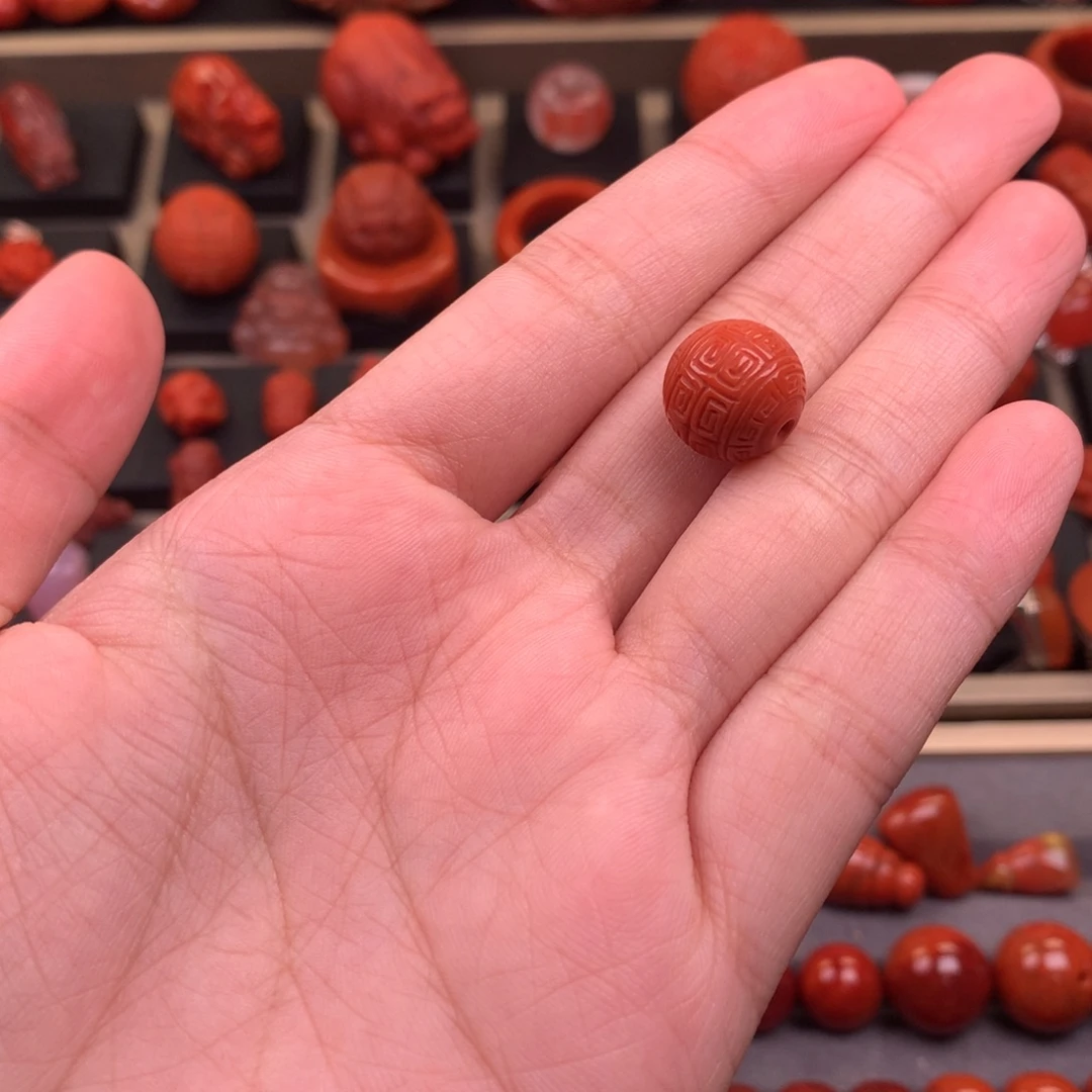 杨***伊南红玛瑙未镶嵌回纹圆珠12+
