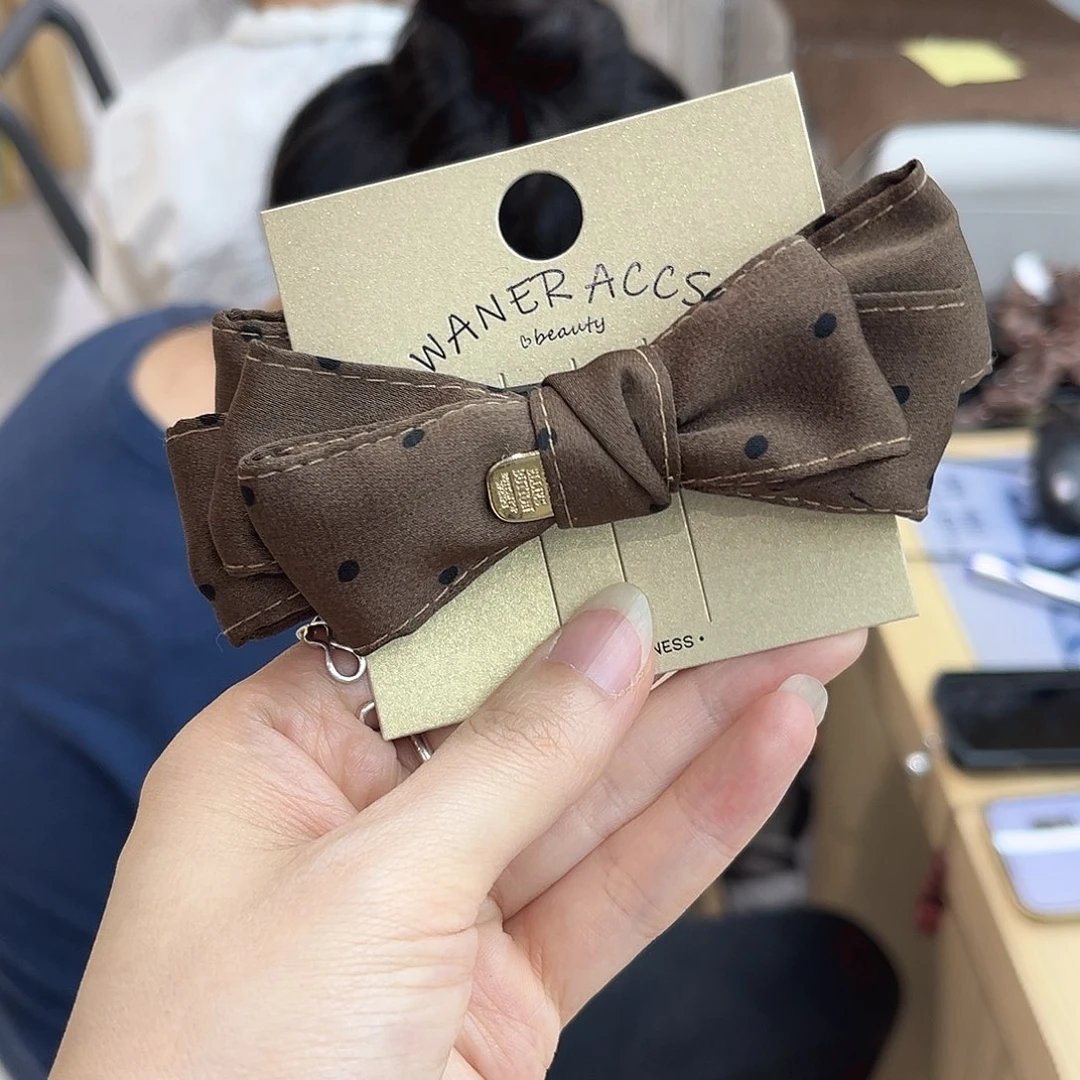 聚***店布艺非金属咖波点香蕉夹