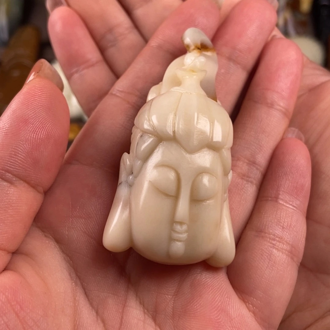 布***咔未镶嵌岫玉手把件