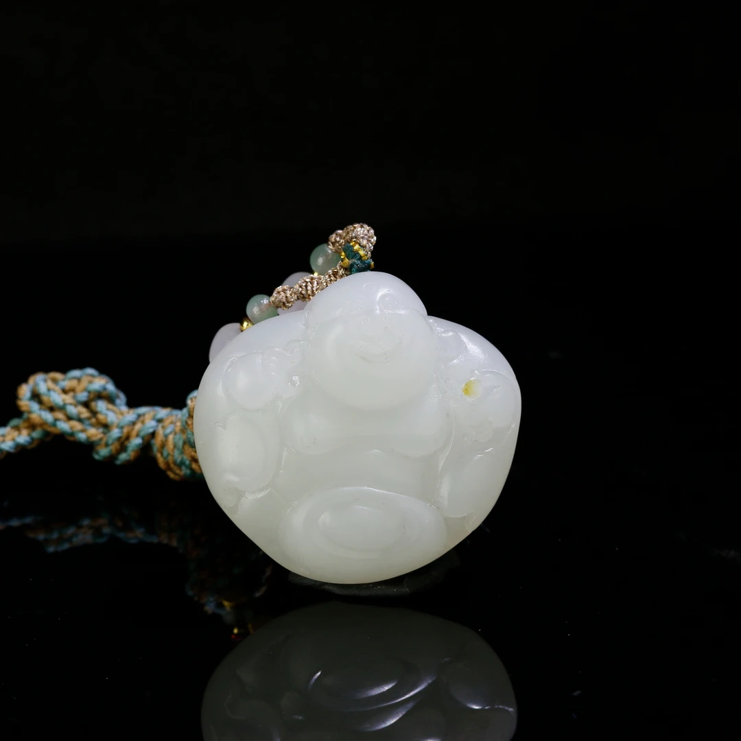 7和田玉羊脂白洒金皮佛/200061保利厦门拍卖