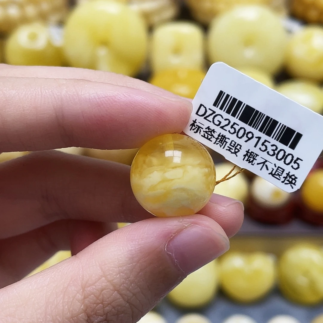 裸石琥珀未镶嵌15.6mm金白溶洞妖花瑕疵