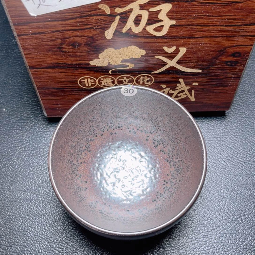 茶盏滴滴答答的声音响