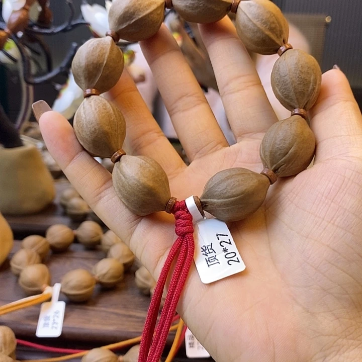 一***耳吊坠橄榄核梅林铁核