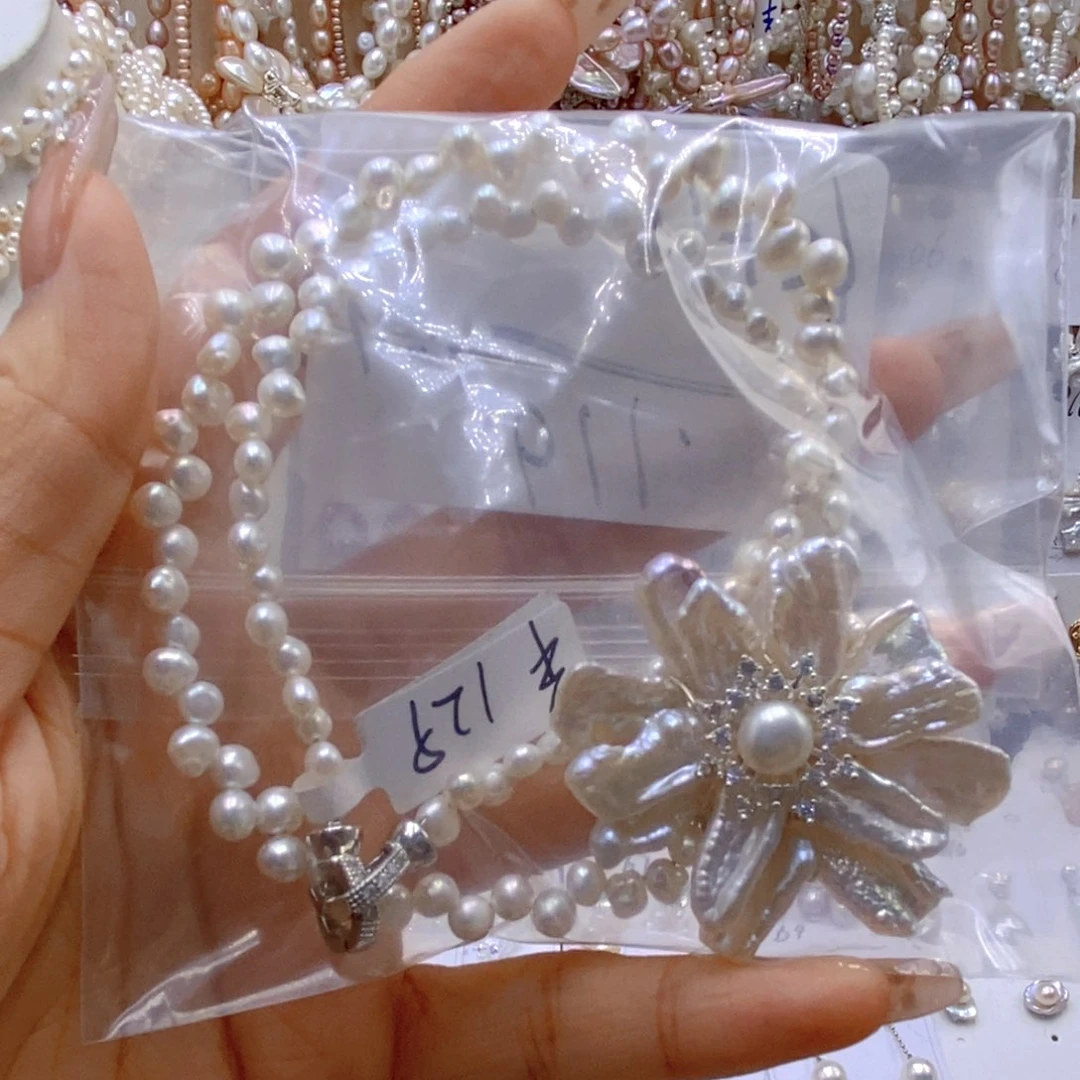 淡水珍珠银S925镶嵌吊坠(不含链)心**湾