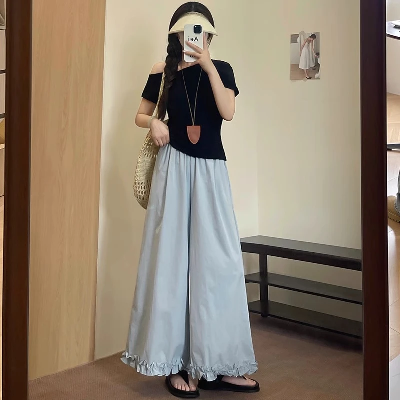 蓝色亚麻裤子女2025新款夏季薄款九分阔腿裤棉麻木耳边冰丝凉凉裤