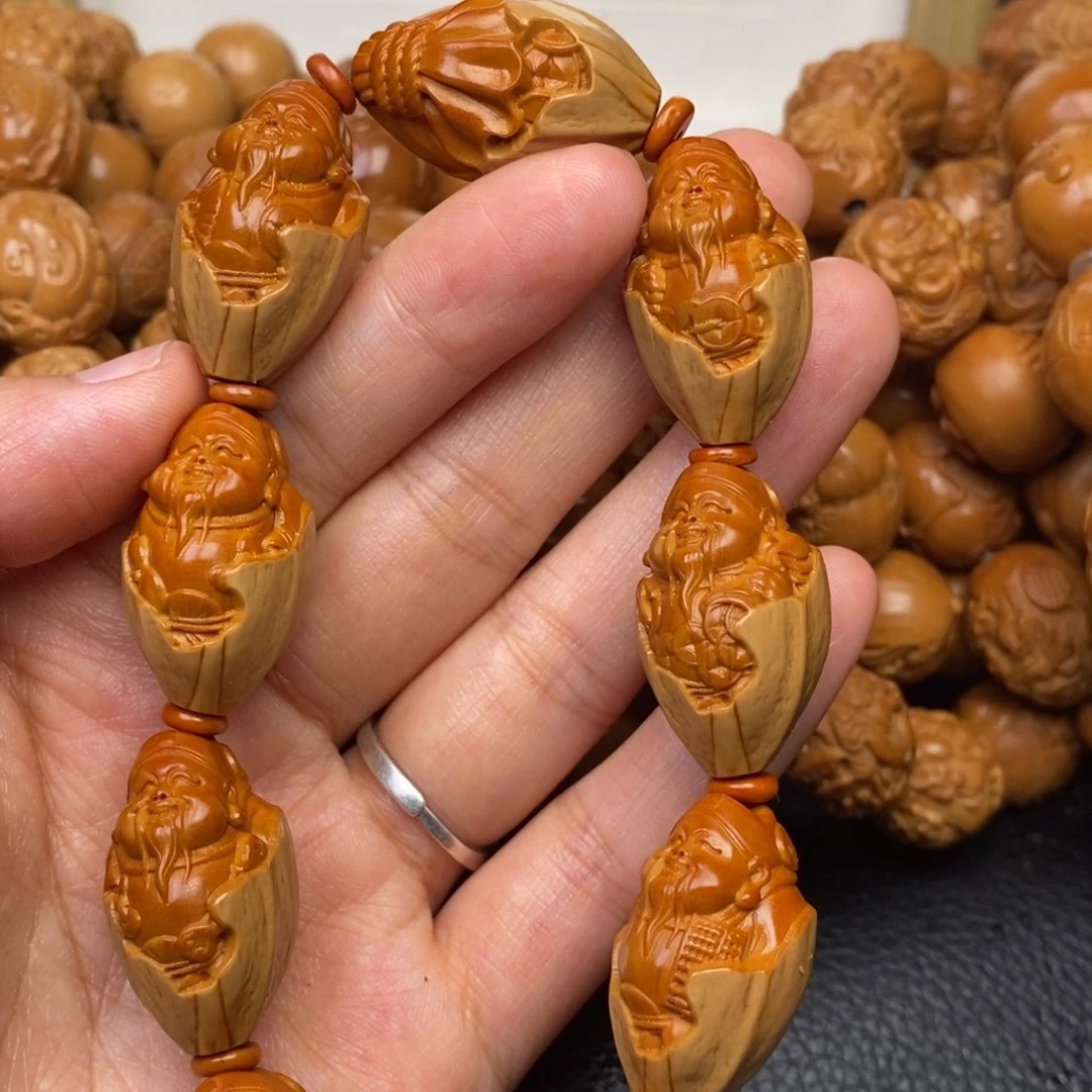 橄榄核吊坠包衣财神1.7