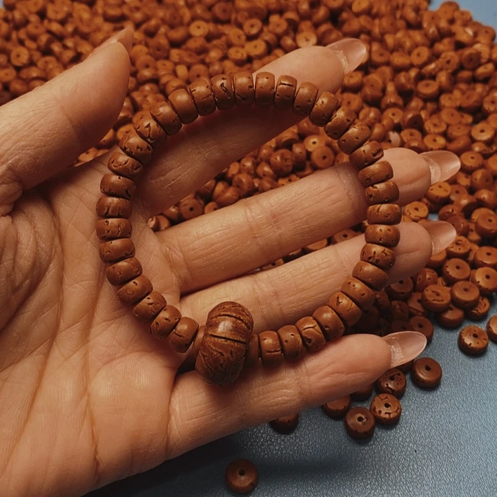 桃核手串核片8.4花皮色差44颗