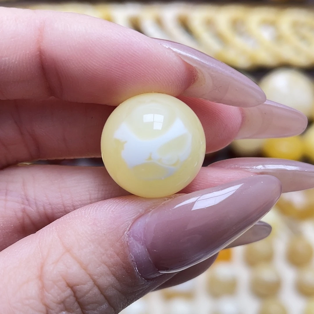 瞅***º琥珀未镶嵌裸石16.7mm圆珠