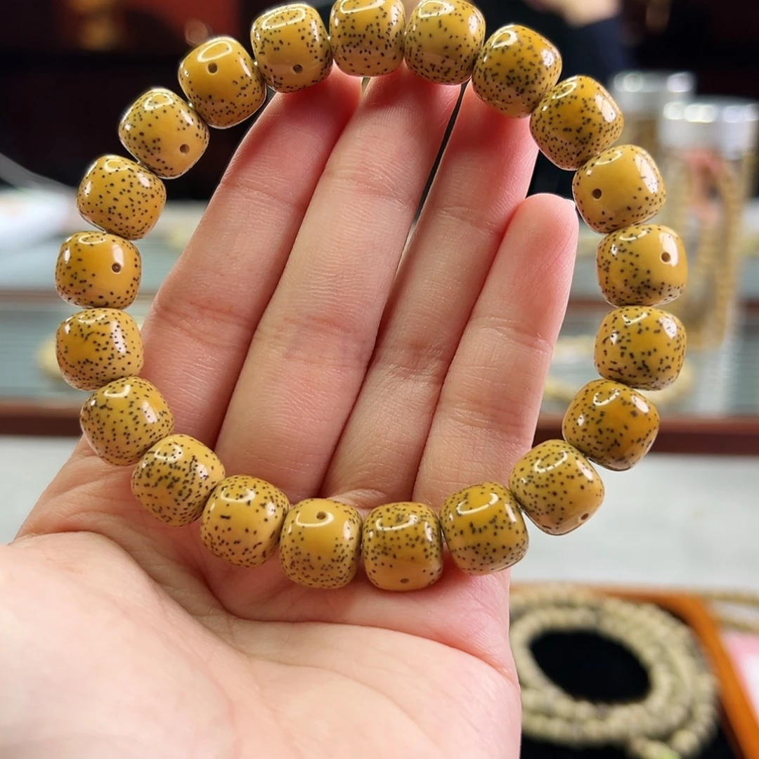 星月菩提手串Fqh12*11鸡油黄 大眼睛留白 细小星