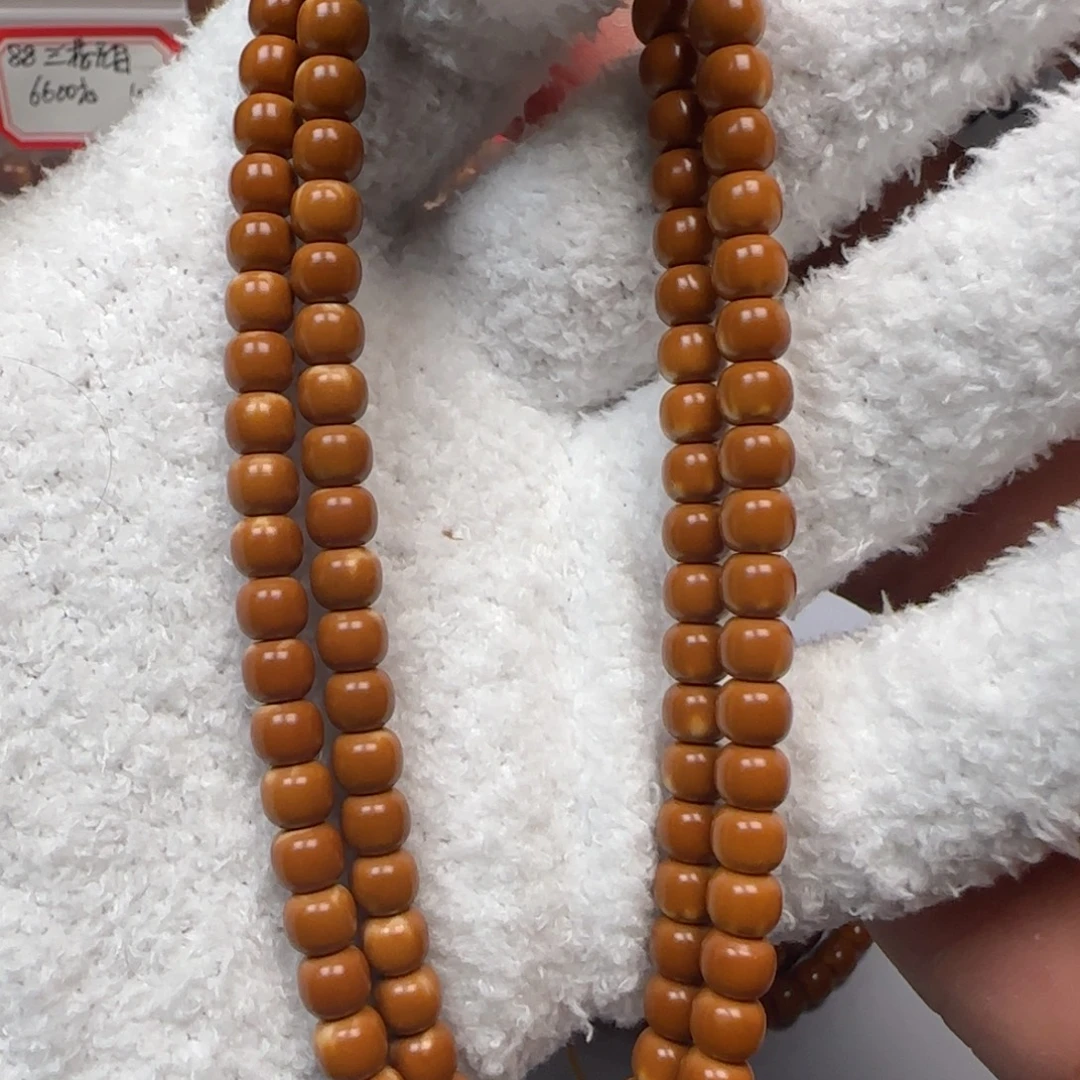 橄榄核吊坠老挝6.1mm老型长串