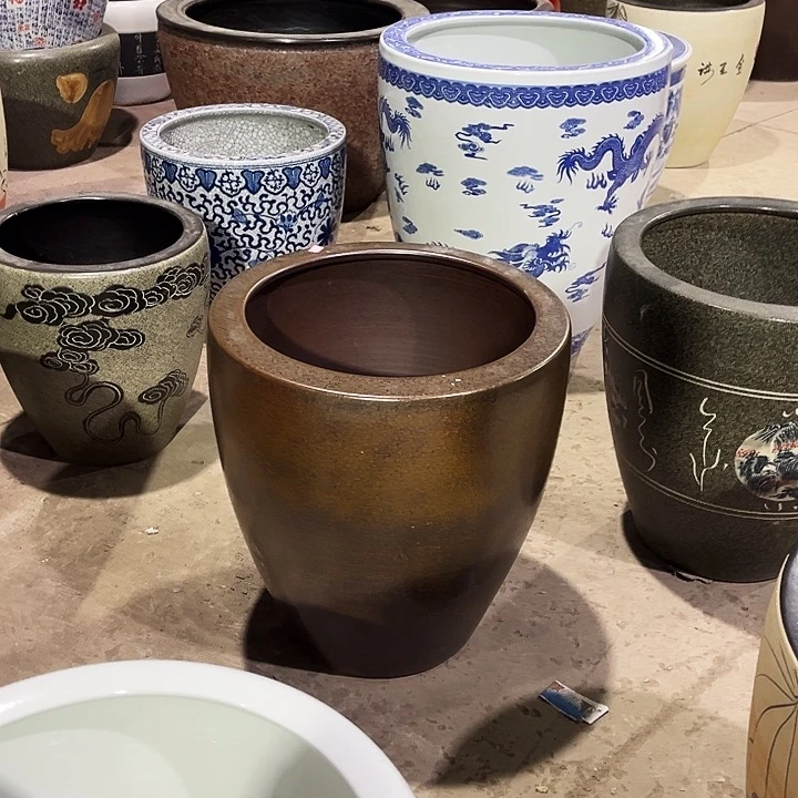 淘***人景德镇陶瓷鱼缸艺术