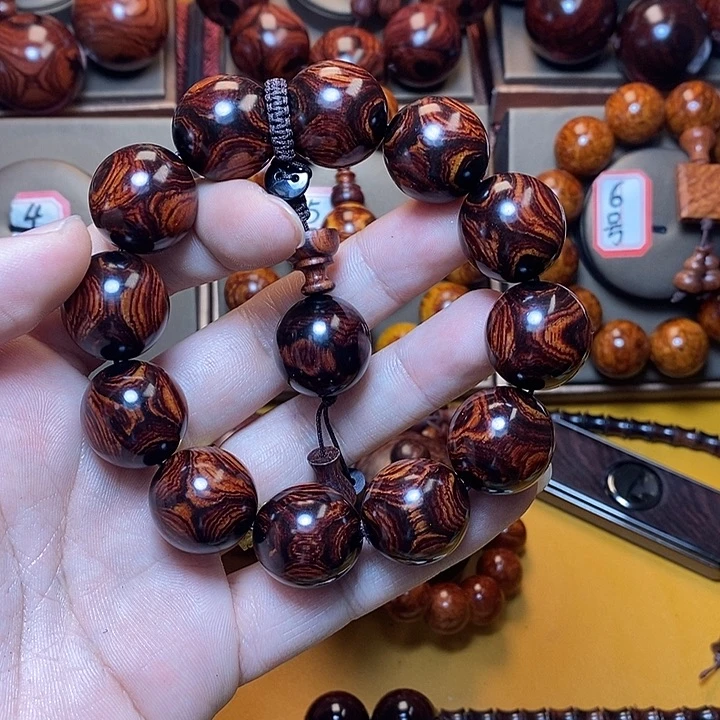 黄花梨/降香黄檀粤****馆2.0对眼鬼脸对眼