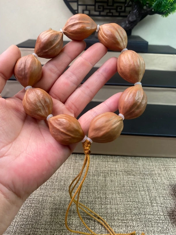 橄榄核2.4原皮铁核手持