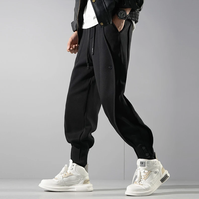 彦正秋冬新款加绒休闲裤男潮牌宽松束脚运动卫裤黑色排扣哈伦裤子