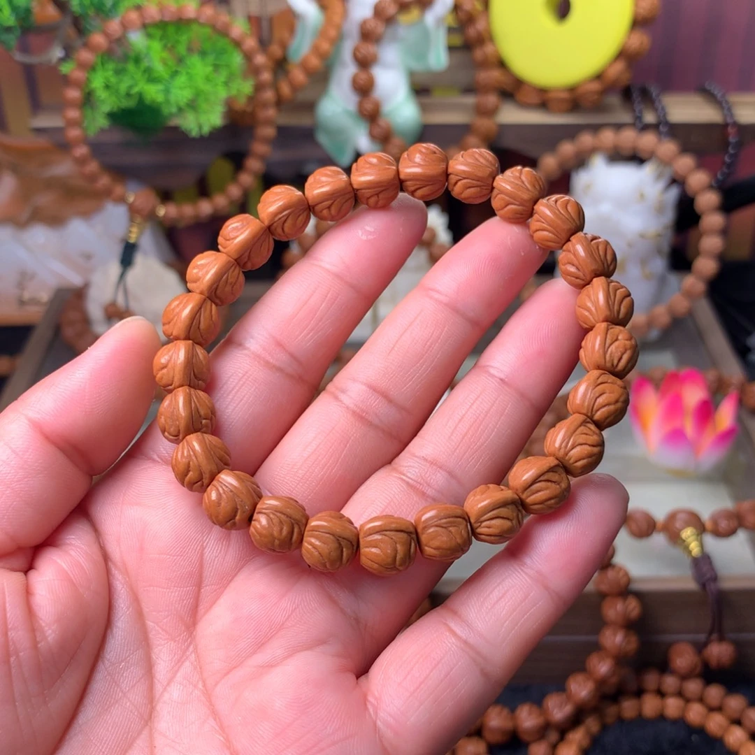 万***空桃核吊坠金玉龙手串10