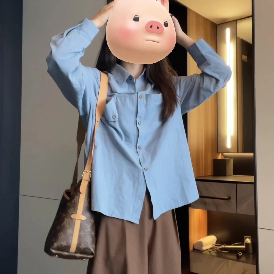 松弛感蓝色衬衫女秋季新款通勤穿搭外穿衬衣百搭设计感慵懒风外套