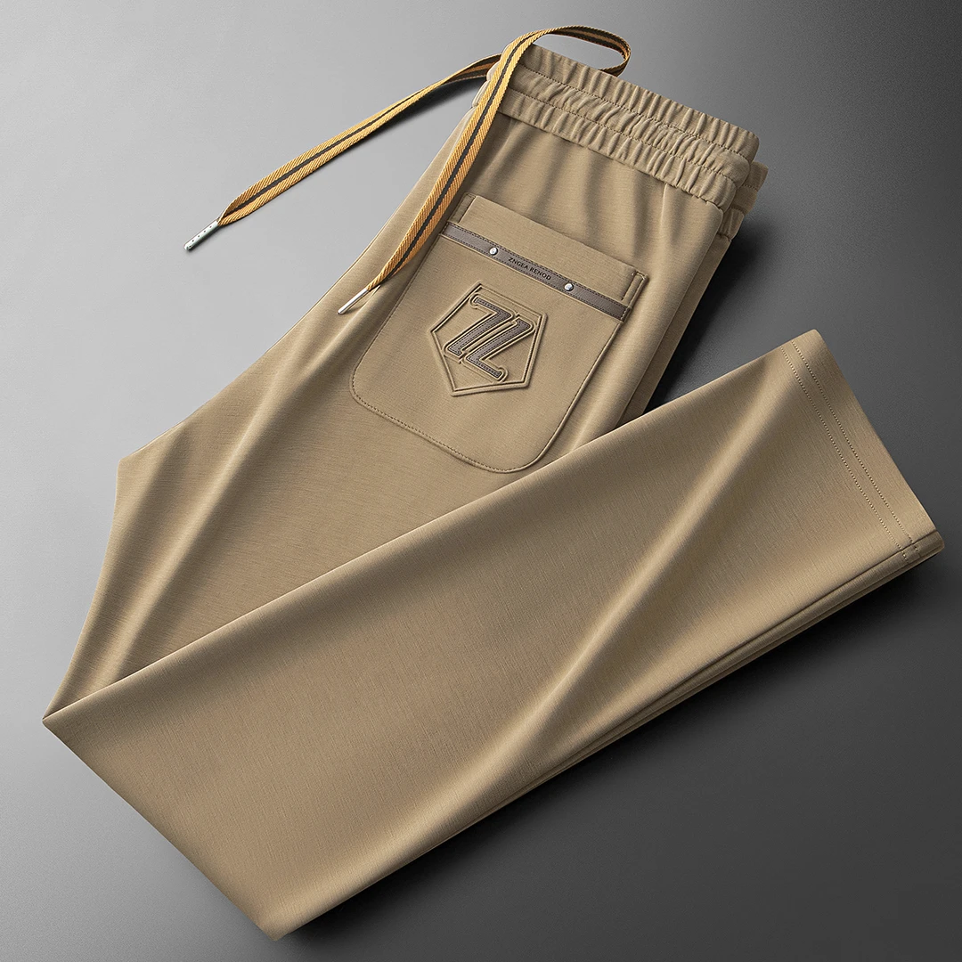 EOENKKY高端轻奢压胶时尚直筒微弹力百搭修身潮流男士休闲卫裤