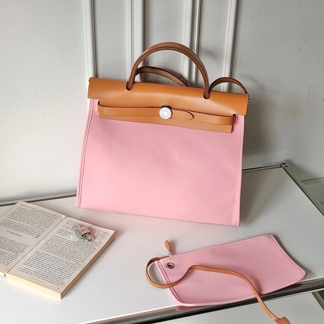 95新 Hermes/爱马仕 粉色银扣帆布拼皮Herbag31手提单肩包 44159