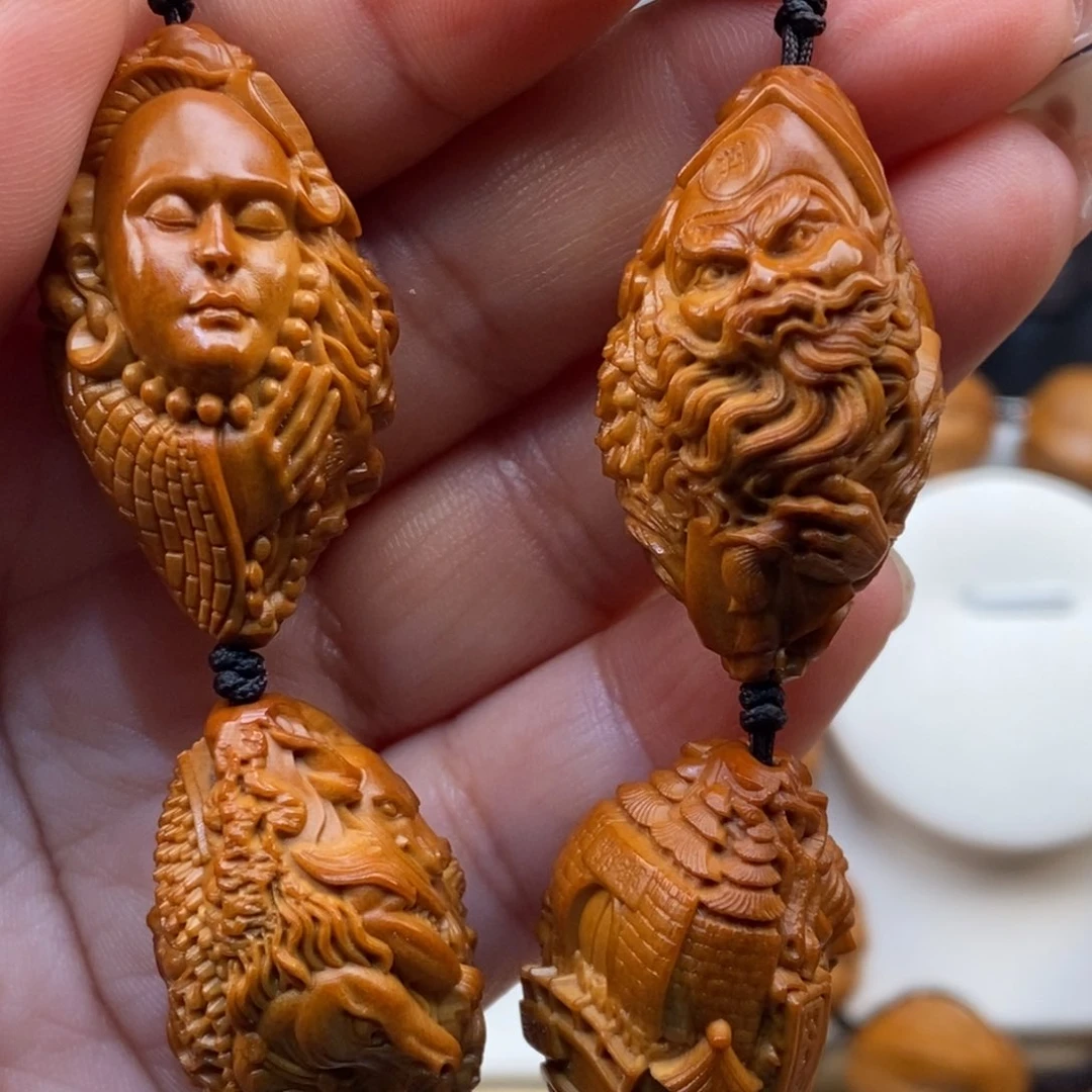 橄榄核吊坠橄榄人发不斤斤计较呢