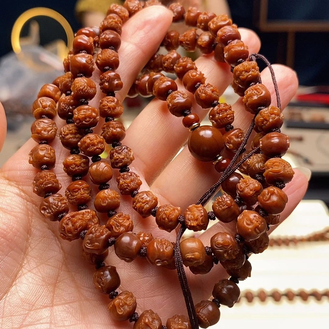 橄榄核手串108单面罗汉0.8核尖