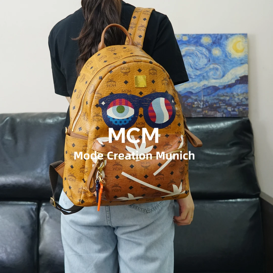 95新 MCM 干邑色双肩包/YW06405527/5527