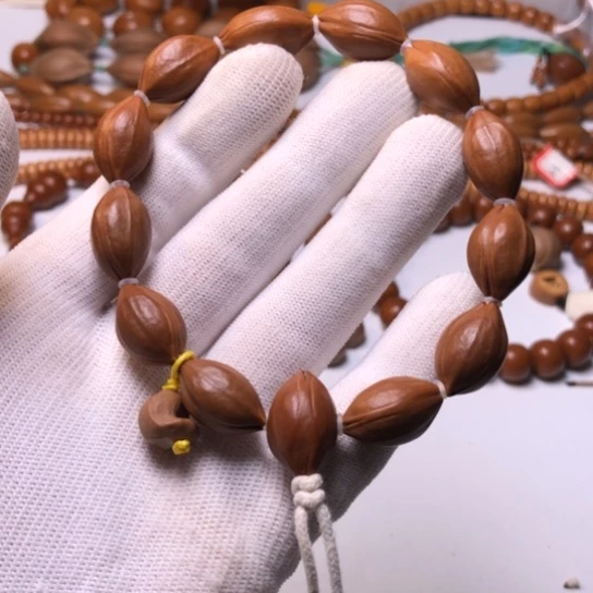 橄榄核手串一****银1.2+原皮手串