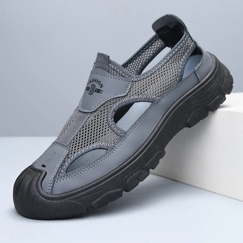 夏季新款透气包头镂空休闲百搭老北京防滑开车专用凉鞋男款沙滩鞋