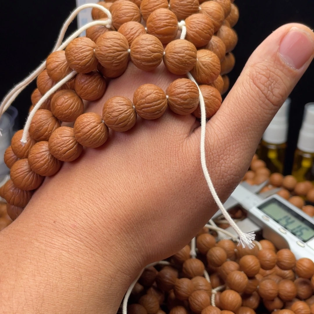 猴头核桃吊坠凤羽手持