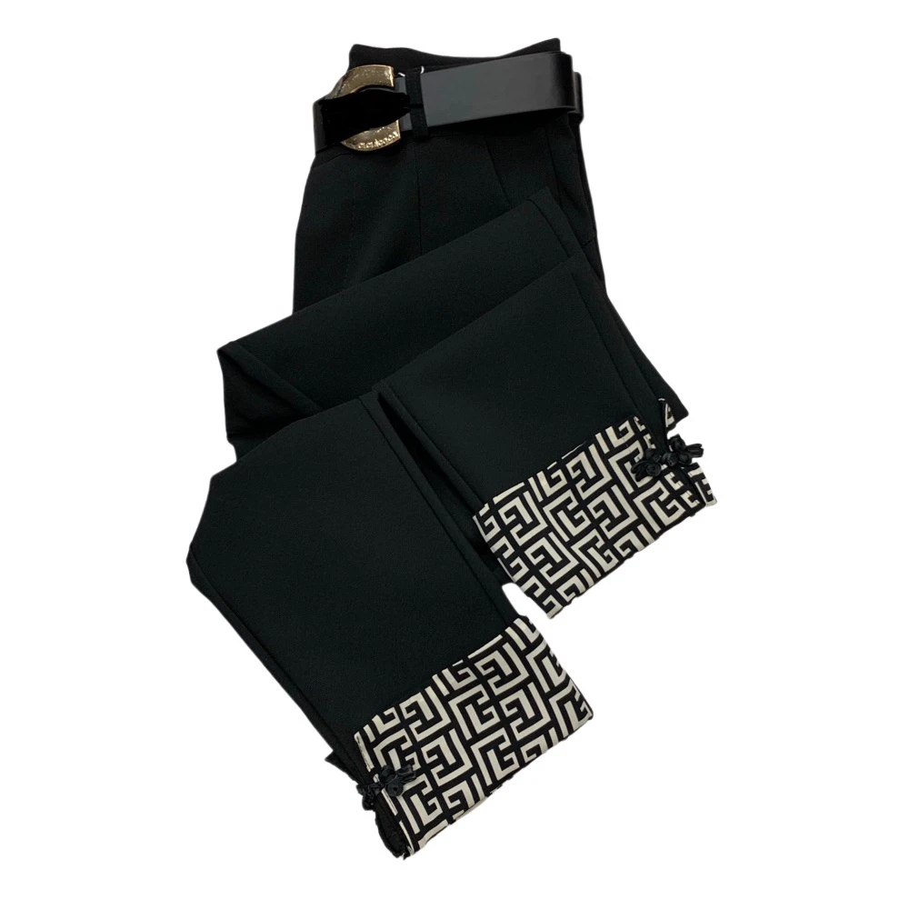 B562中式拼接中国风盘扣弹力九分小脚女裤春秋季（带腰带样式随机）