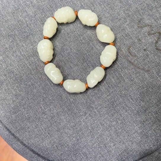 一***。和田玉未镶嵌挂件