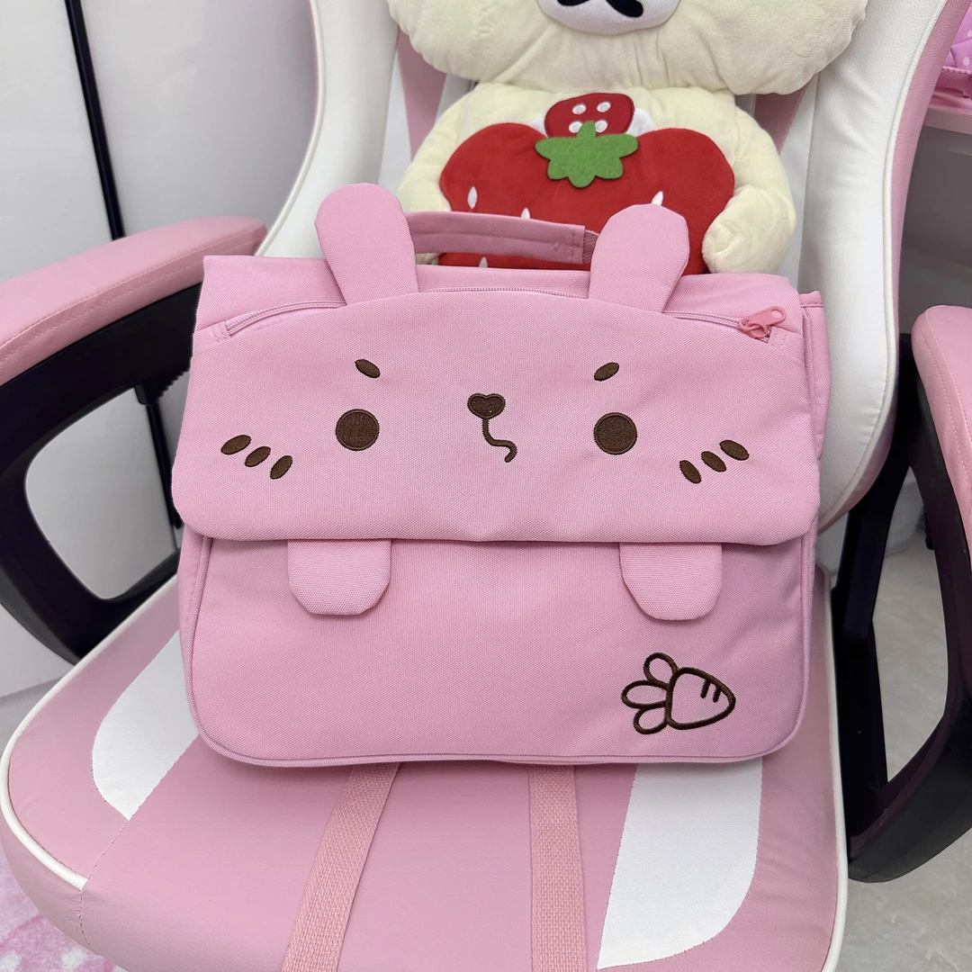 邱邱自制日系可爱帆布颜文字小兔子软妹耐脏刺绣双肩背包制服包