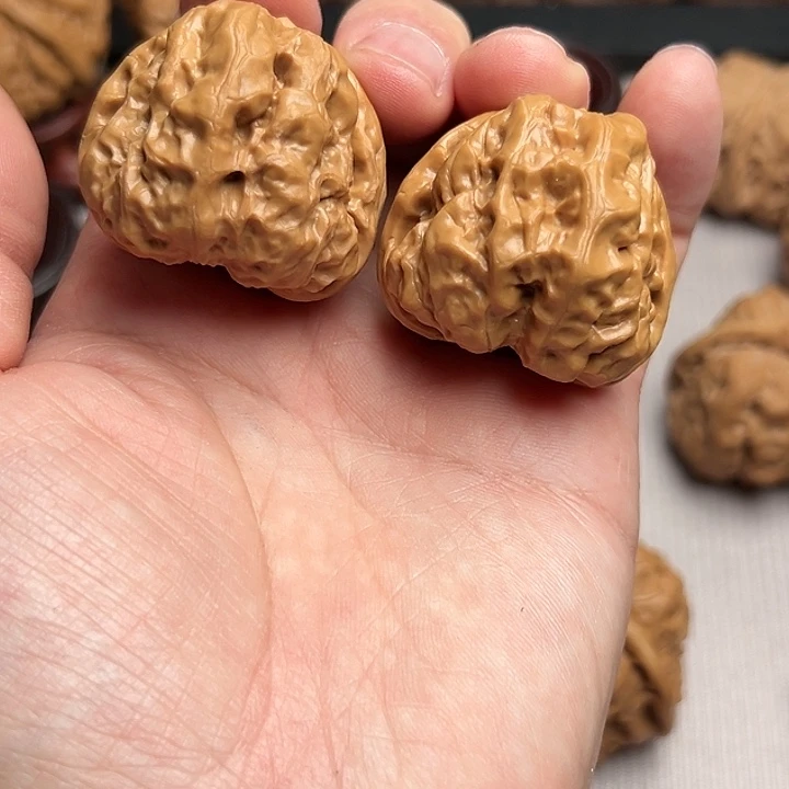 高***你桃核吊坠文玩核桃手把件