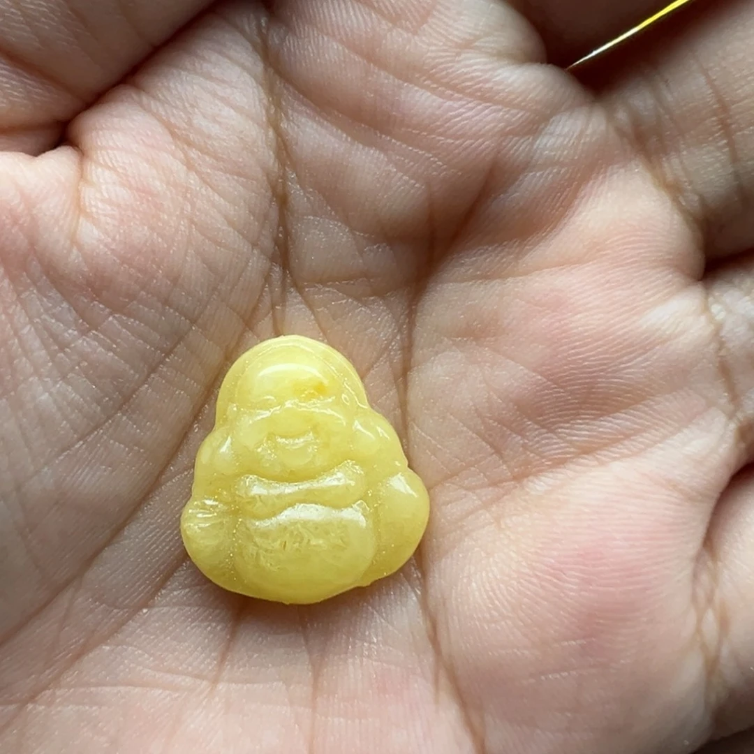 是***呀琥珀未镶嵌珠宝奇石佛打孔不退换