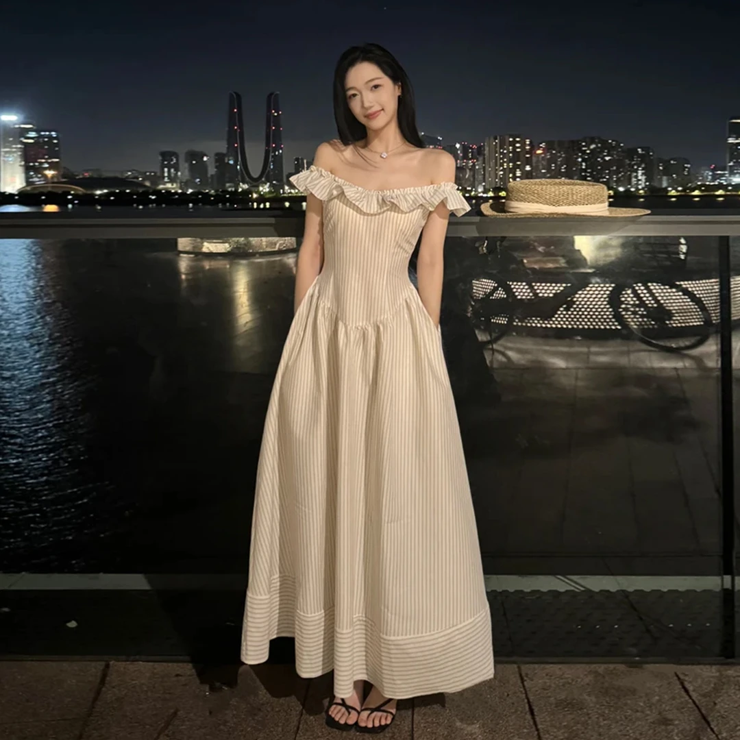 法式白色条纹一字肩吊带连衣裙子女夏季2025年新款度假风长裙5314