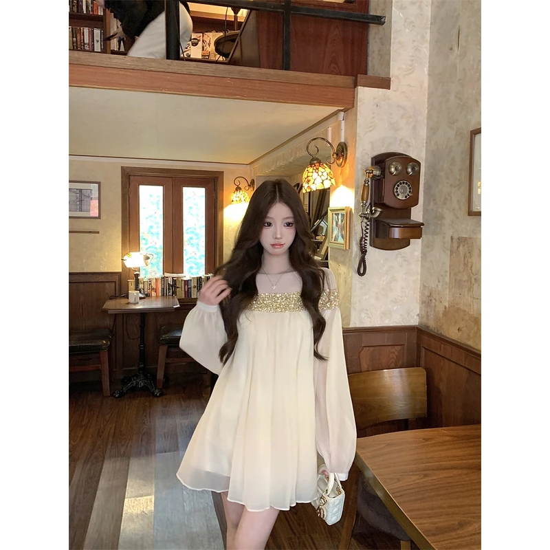 2025新款法式气质温柔网纱纯欲性感亮片拼接连衣裙宽松温柔短裙女
